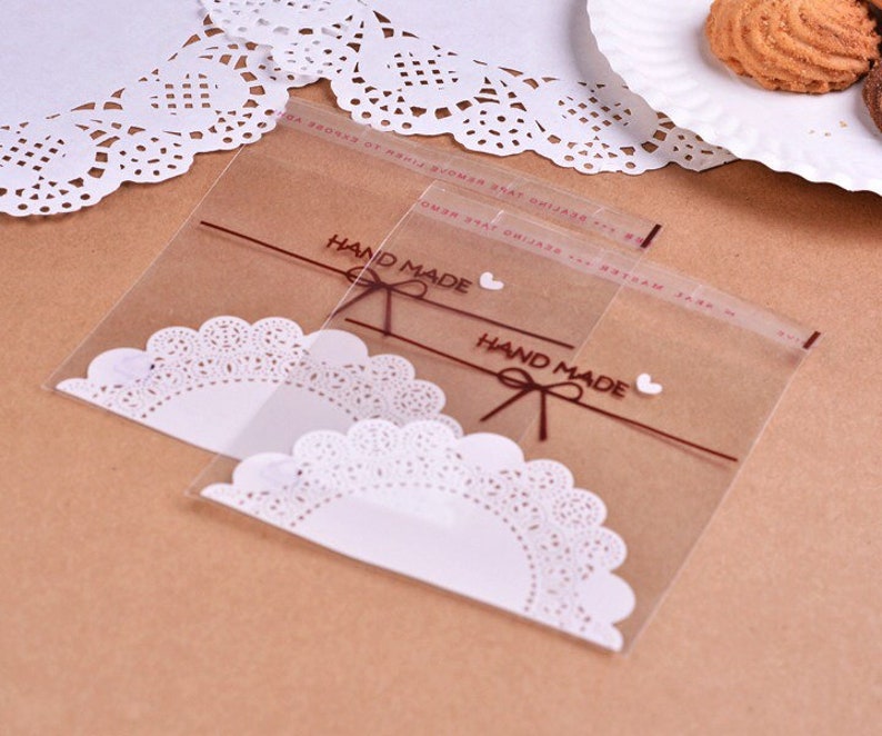 100x Handmade Lace Doilies OPP Cookie Bags \u2022 Party Wedding Favor Bags Gift Bags \u2022 Sweets Bar Buffet Decoration Bags \u2022 1st Birthday Gift Bags