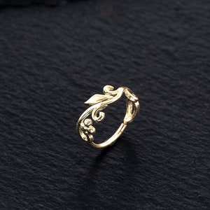 A beautiful leaf helix cartilage hoop in 14k gold plated over a sterling silver base.