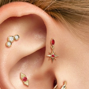 Pendiente colgante con forma de estrella de rubí, pendiente con rubí marquesa, pendiente con rosca interna en el labio de oro de 14 quilates, pendiente con hélice hacia adelante, perforación con rubí en oro