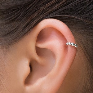Helix white gold earrings top