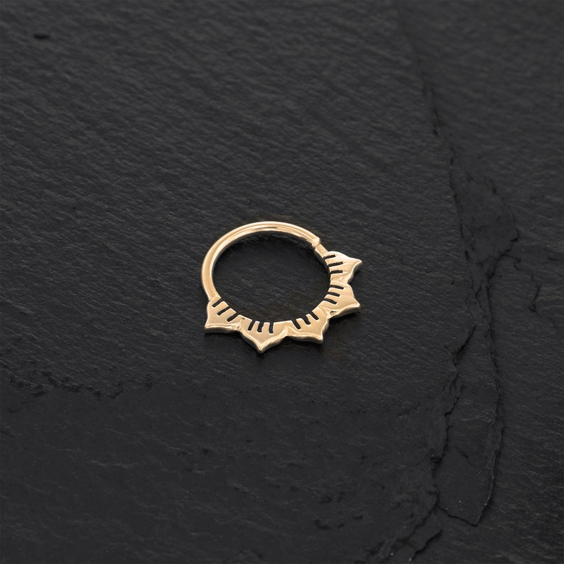 Minimalist 14k gold plated sterling silver septum ring with a unique lotus shape design.