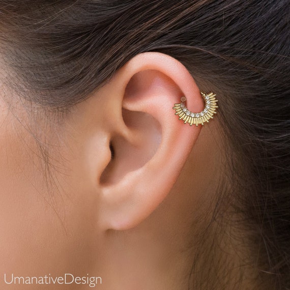 Helix piercing with clear diamonds on leafs