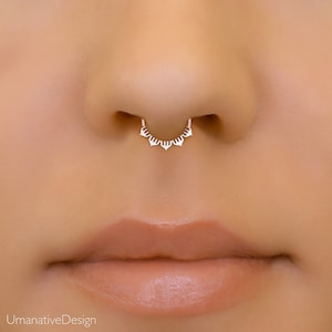 Minimalist tiny sterling silver septum ring with a unique lotus shape design. 6mm in diameter.