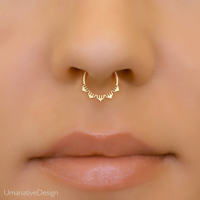 Minimalist 14k gold plated sterling silver septum ring with a unique lotus shape design. 8mm in diameter.