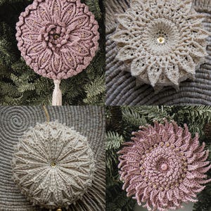 May include: Four handmade crochet ornaments in pink and beige hues. Each features a unique floral design with beaded accents and a tassel. The ornaments are displayed against a backdrop of greenery and woven textures, ideal for festive decorations.