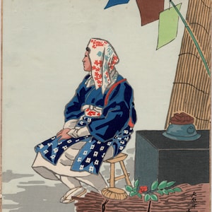 May include: A woodblock print depicting a person wearing a blue robe and a white and red patterned head covering. The person is sitting on a wooden stool with a dark blue and brown object in the background. The print is signed in Japanese characters.
