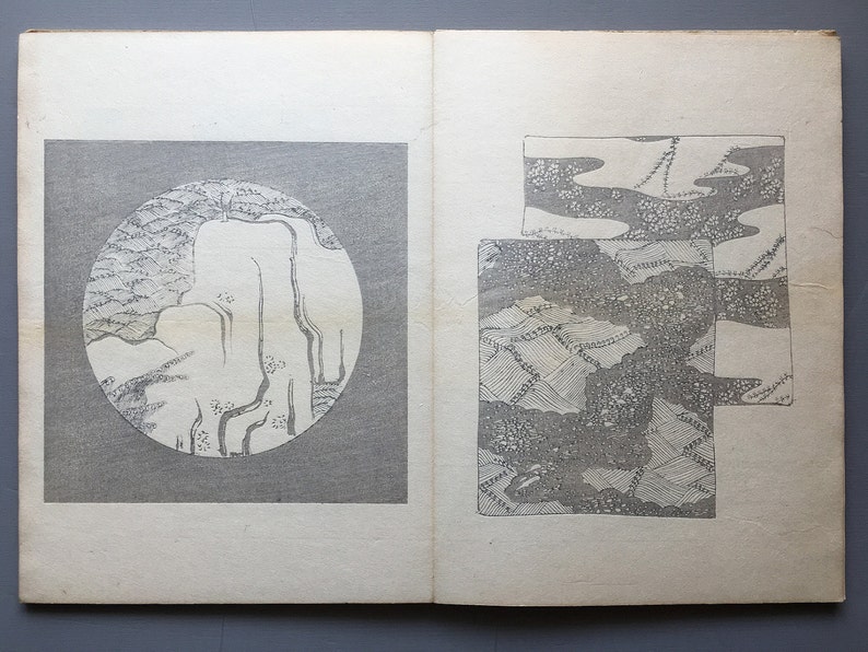 May include: A black and white illustration of a landscape with mountains and clouds. The illustration is in a circular shape on the left side of the page. On the right side of the page, there are two smaller illustrations of landscapes with mountains and clouds.