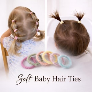 May include: An image shows two children with their hair styled using soft baby hair ties. The hair ties are in various pastel colors, including pink, green, yellow, peach, and blue. The text "Soft Baby Hair Ties" is displayed at the bottom of the image.