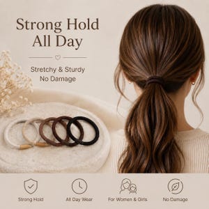 May include: A set of five circular hair ties in shades of cream, beige, light brown, dark brown, and black. The text reads: Strong Hold All Day, Stretchy & Sturdy No Damage, Strong Hold, All Day Wear, For Women & Girls, No Damage.