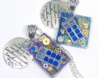 May include: Two silver necklaces with blue and purple resin pendants featuring a TARDIS design with gears and glitter. One pendant has the text "Something old, Something new, Something borrowed, Something blue". The other pendant has the text "Something old, Something new, Something borrowed, Something blue".