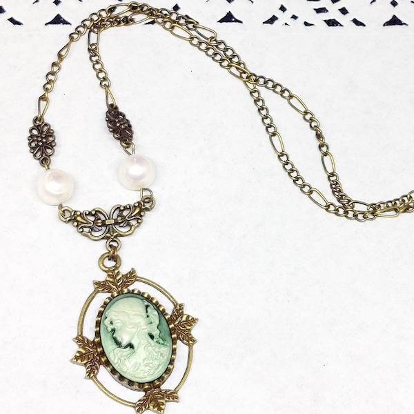 Victorian style light green resin cameo necklace with leaf design setting and freshwater pearls inspired by Katherine Pierce's jewelry