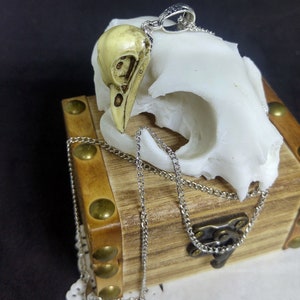 Antiqued resin crow skull pendants, handpainted, available with silver tone chain or faux leather chord