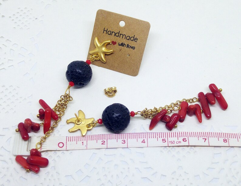 Golden starfishes long earrings with red coral and lava stone black beads