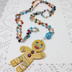Zenzy: długi naszyjnik w stylu różańca z żywiczną zawieszką Gingerbread Man od Shreka