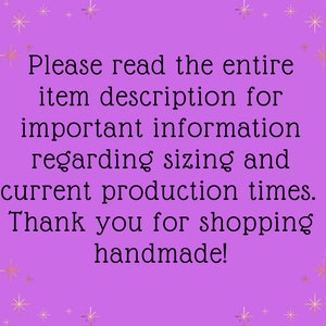 May include: A purple background with gold star accents and black text. The text reads: "Please read the entire item description for important information regarding sizing and current production times. Thank you for shopping handmade!"