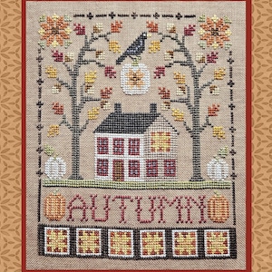 May include: Cross-stitch design depicting a house, pumpkins, and trees with autumn leaves. A black bird sits on a pumpkin. The word "AUTUMN" is stitched below the house. The colour scheme includes browns, oranges, yellows, and reds.