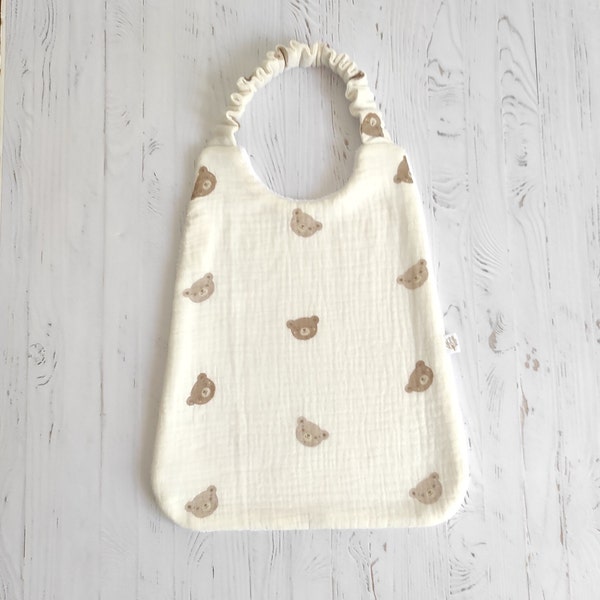 Bib in double gauze fabric with Oekotex teddy bear motif, elasticated neck circumference