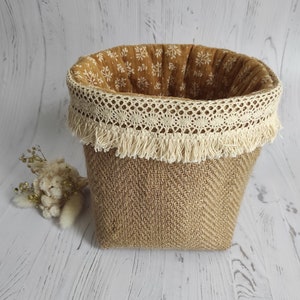 Pretty storage basket in chevron jute canvas, double Oekotex foliage gauze.