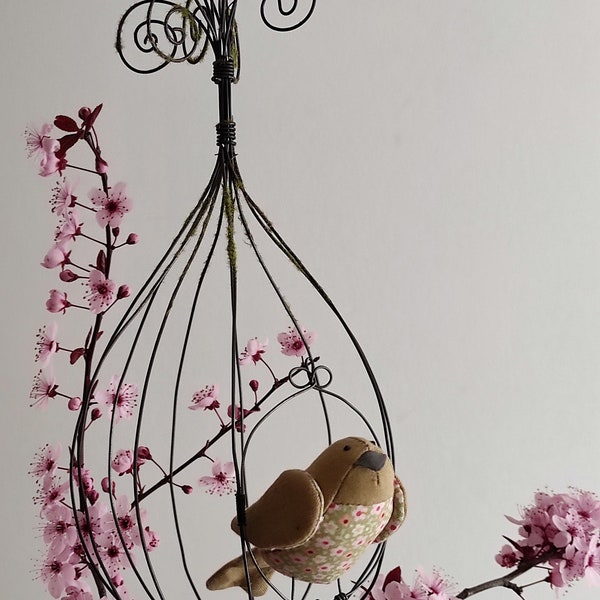 Cage in annealed wire with a small bird in liberty fabric entirely handmade.