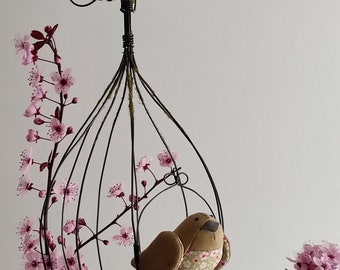 Cage in annealed wire with a small bird in liberty fabric entirely handmade.