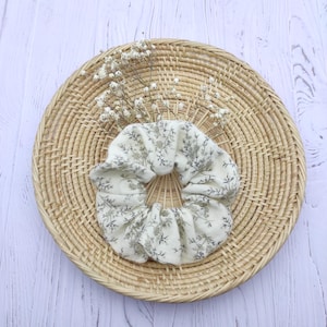 children&#39;s hair scrunchie with small brown flower pattern