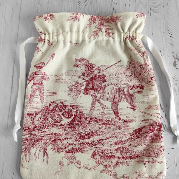 Pochon en toile de Jouy "bord de  mer " et tissu coton motif rayure.