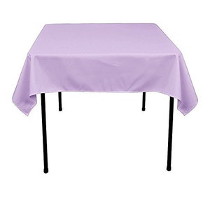 May include: A lavender tablecloth draped over a square table with black metal legs.