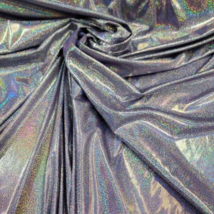 May include: Silver iridescent fabric with a subtle sparkle. The fabric has a smooth, silky texture and is perfect for crafting projects.