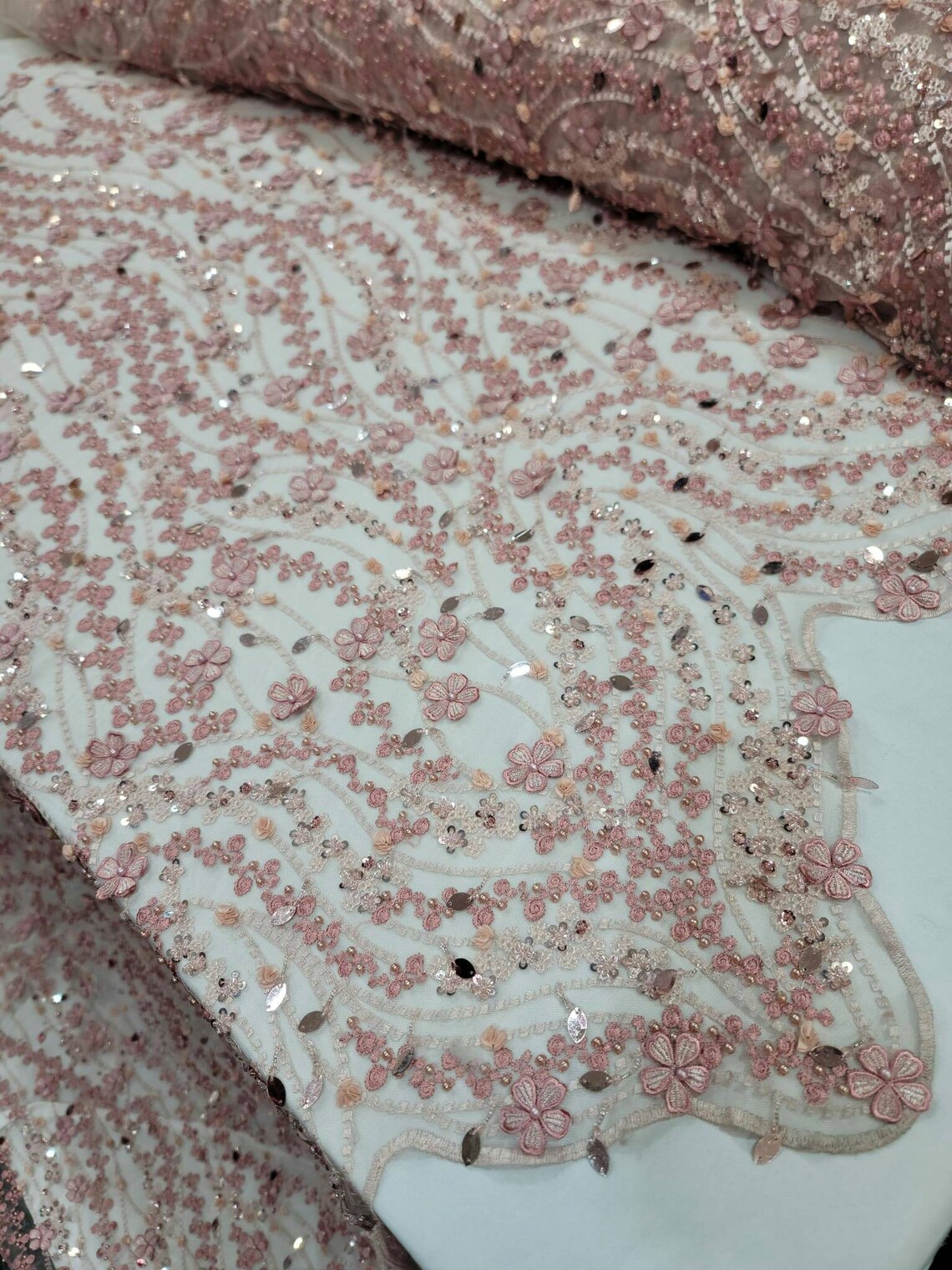 Dusty rose diva design embroidery with heavy beaded on a mesh lace-sold by the yard.