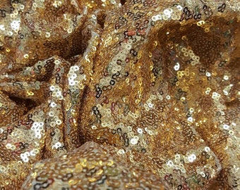 Tela de lentejuelas doradas: Amarillo brillante sobre malla (60 pulgadas de ancho)