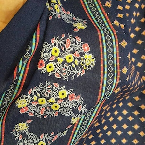 100% Rayon Challis Floral, 70&#39;s inspired Print Fabric by the yard double scalloped small yellow floral on navy blue background