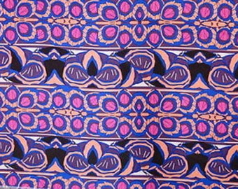 100% Rayon. Tropical Inspired Print with Hues of Fuchsia, Blue, Brown and Black Hues. 58-60 Inches Wide Sold by the Yard