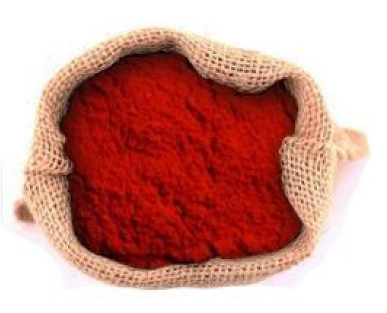 May include: A burlap sack filled with a vibrant red powder, likely paprika or chili powder.