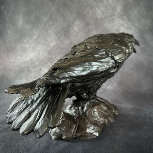 Cast bronze life-sized raven sculpture by Kindrie Grove