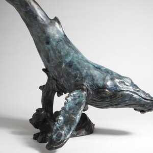 Lost wax cast bronze Humpback Whale sculpture by Kindrie Grove.