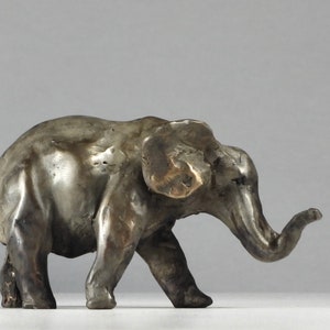Tiny Giant IV, Bronze Elephant Sculpture: Hand-Cast Miniature Art by Kindrie Grove