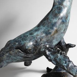 Lost wax cast bronze Humpback Whale sculpture by Kindrie Grove.