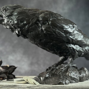 Cast bronze life-sized raven sculpture by Kindrie Grove