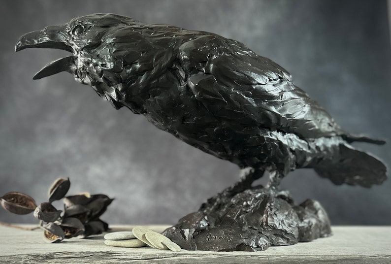 Cast bronze life-sized raven sculpture by Kindrie Grove