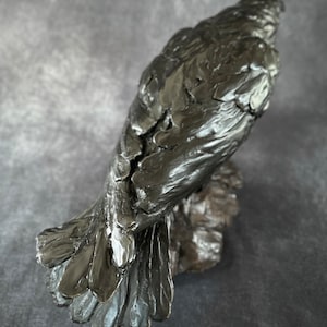 Cast bronze life-sized raven sculpture by Kindrie Grove