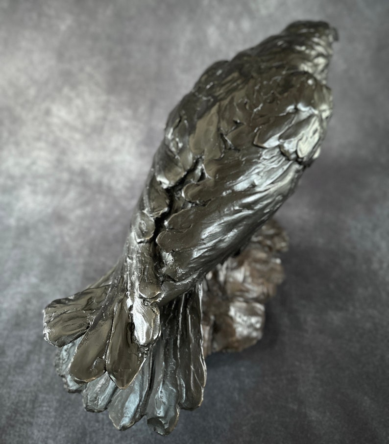 Cast bronze life-sized raven sculpture by Kindrie Grove