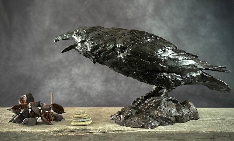 Cast bronze life-sized raven sculpture by Kindrie Grove