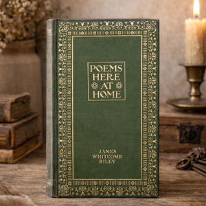 May include: A vintage book titled "Poems Here at Home" by James Whitcomb Riley, with a green cover and gold decorative accents. The book is standing upright on a wooden surface, with a lit candle and other antique items in the background.
