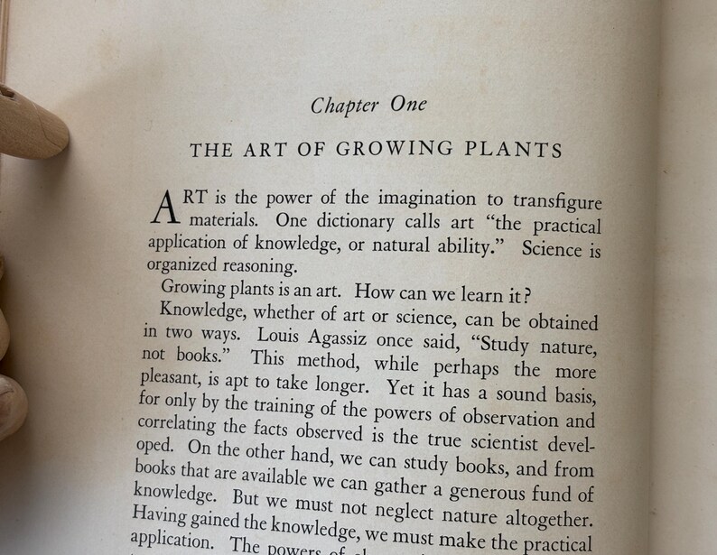 May include: Open book page with the title "THE ART OF GROWING PLANTS" and the first chapter's title. The text discusses the art of growing plants and the importance of observation and knowledge.