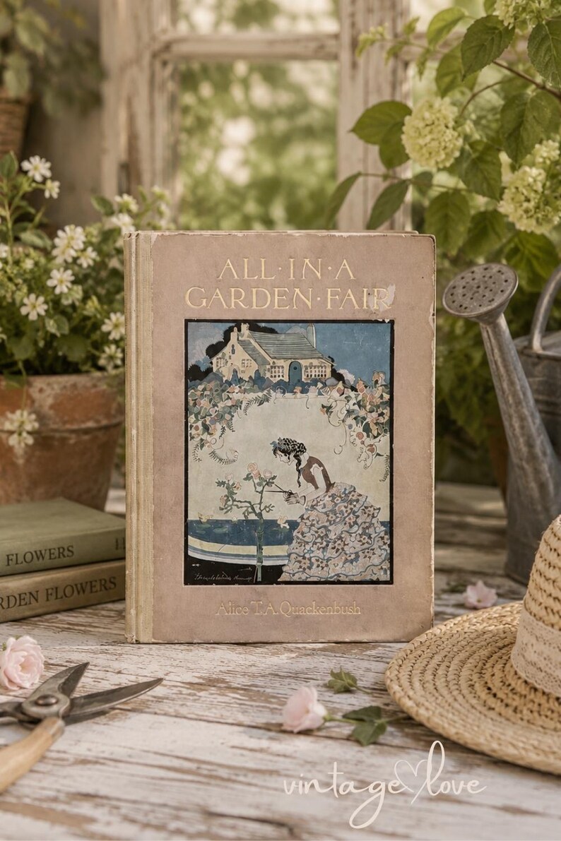 May include: A vintage hardcover book titled All in a Garden Fair by Alice T.A. Quackenbush. The cover features a central illustration of a person in a floral dress tending to roses in front of a cottage, framed by a light brown border.
