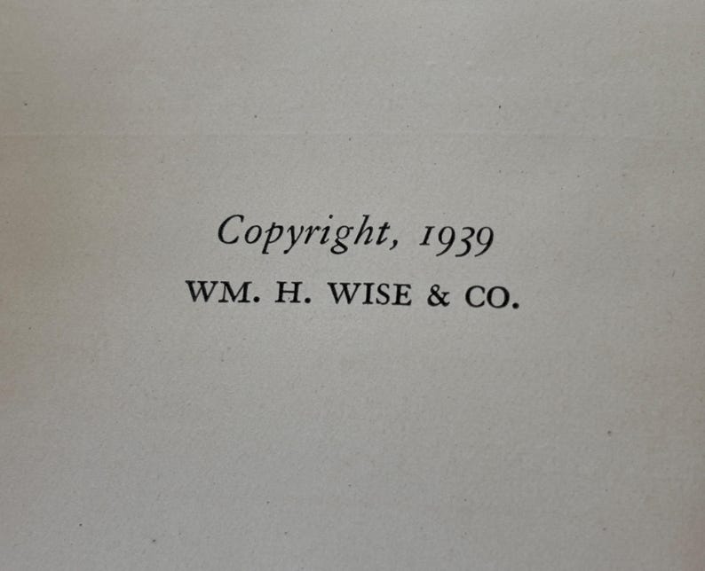 May include: Close-up of a page with the text "Copyright, 1939" and "WM. H. WISE & CO." printed in black. The text is centered on a light beige background, suggesting a vintage book or document.