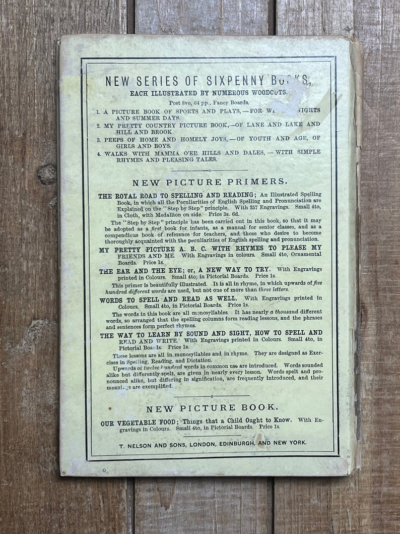 May include: A vintage book cover with a title page for a series of sixpenny books. The cover features a title in bold font, "New Series of Sixpenny Books", and a list of book titles with descriptions. The book cover is printed on a cream-colored paper with black text.