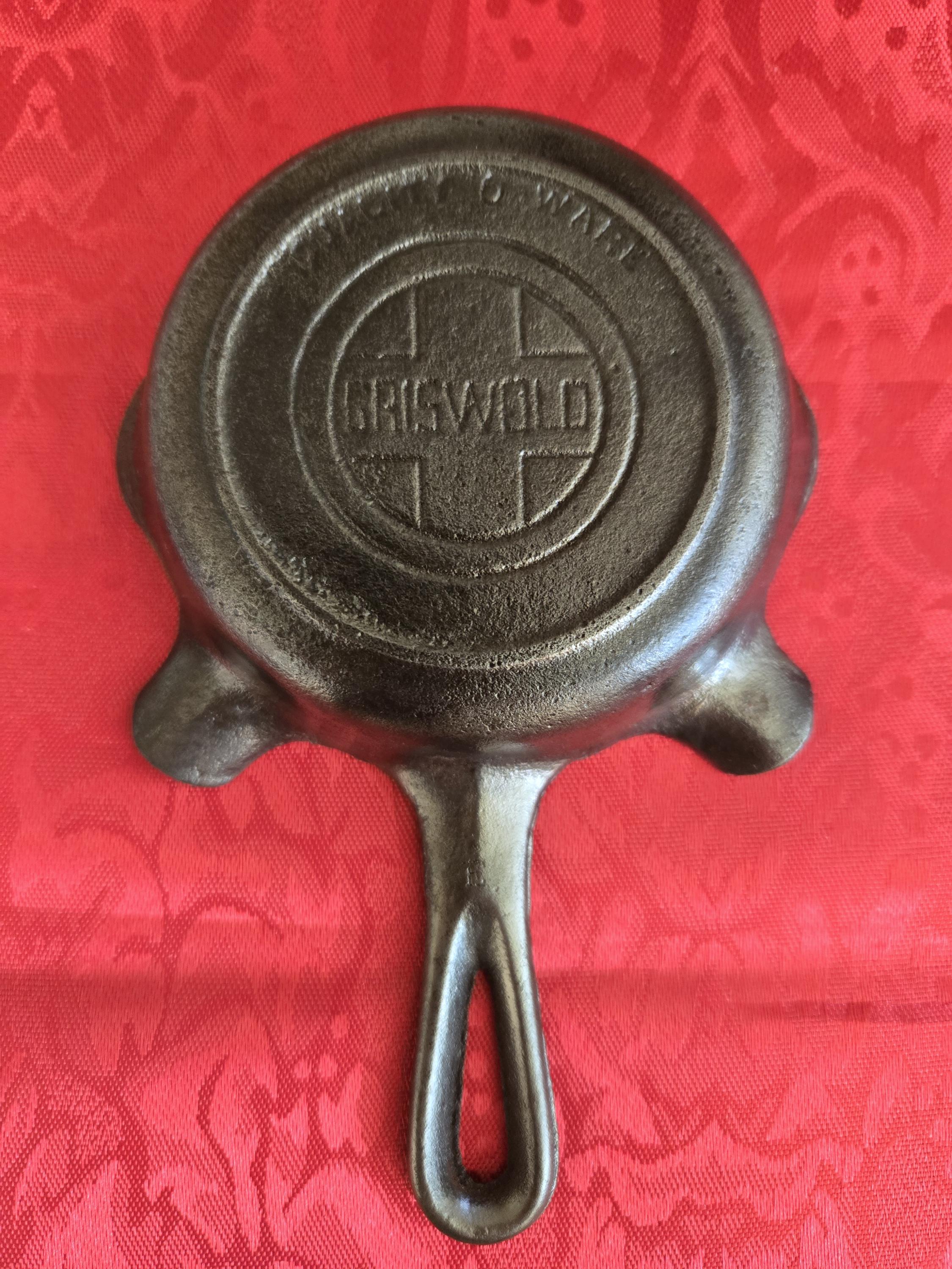 GRISWOLD antique cast iron ashtray.