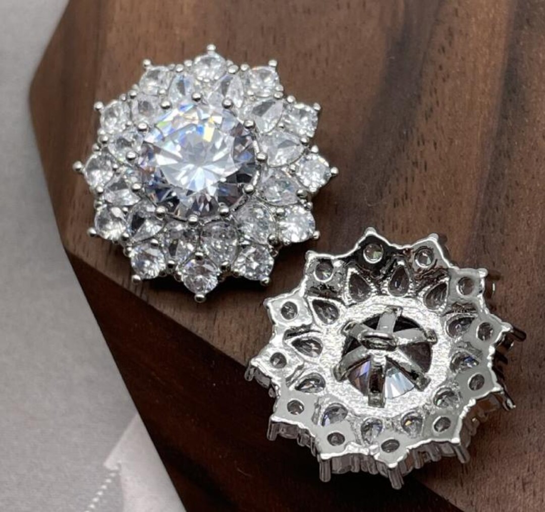 Composizione di fiori in cristallo e argento con dedica