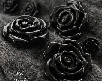 Bottoni a rosa in plastica nera, disponibili nelle misure 15 mm, 20 mm, 25 mm, 30 mm, 34 mm o 39 mm, confezione da 10 (B886)